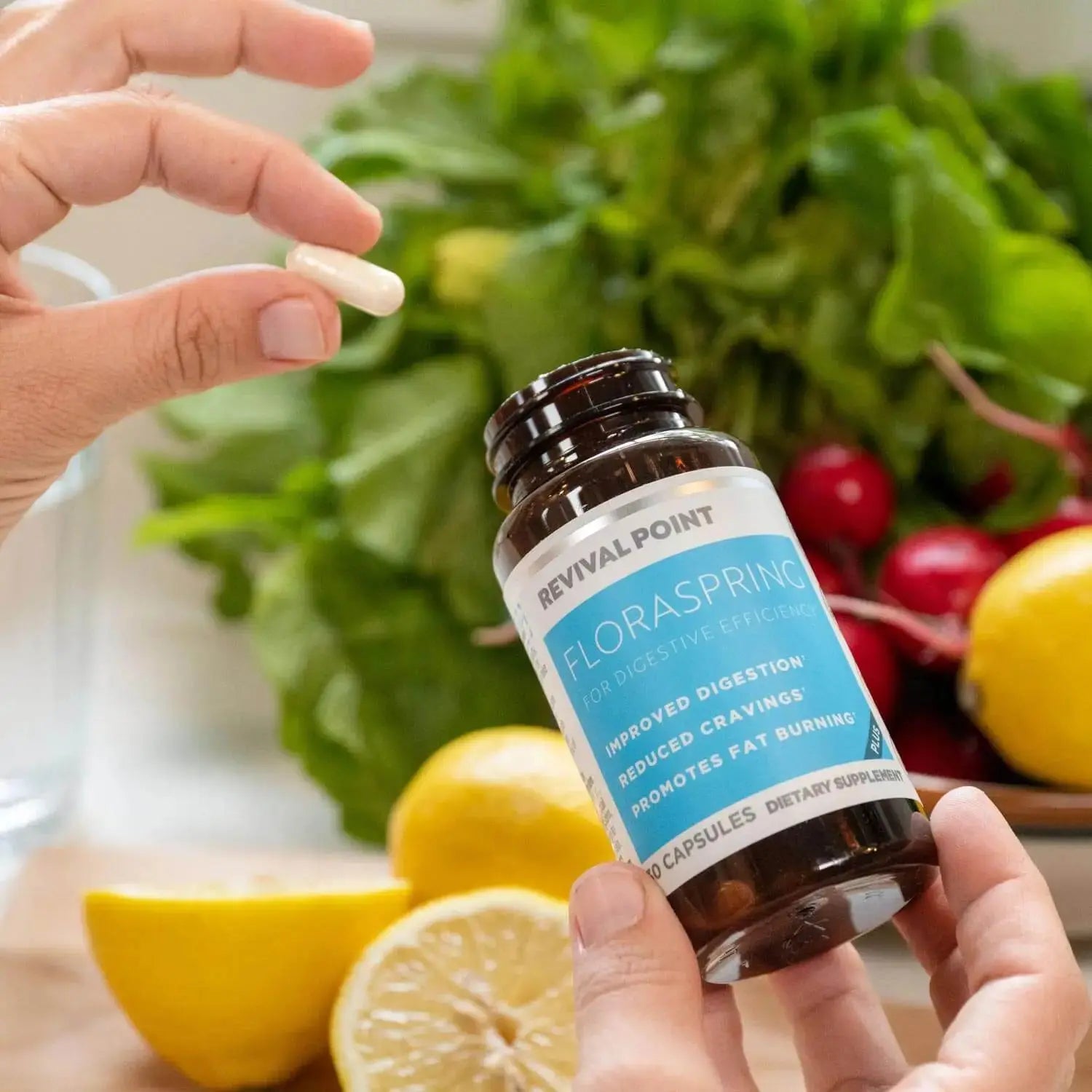 Holding Floraspring Probiotics Bottle