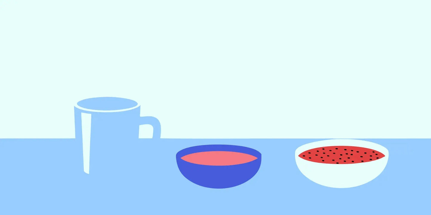 A mug, juice, and fruit, all fast-acting laxative home remedies.