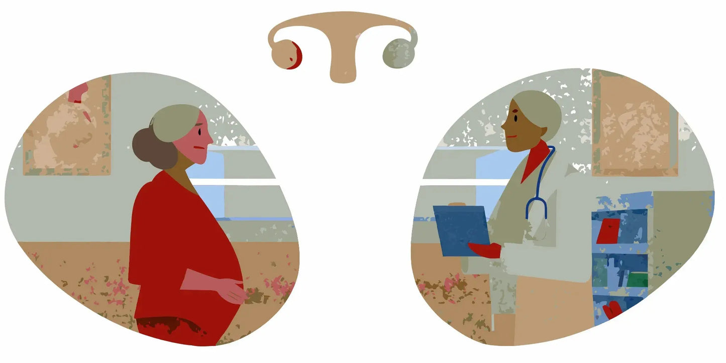 Older woman discussing what is overactive bladder with her doctor